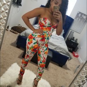 Colorful flowery one piece jumpsuit.